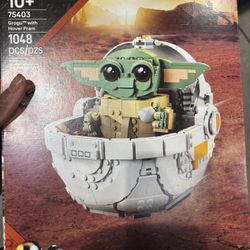 LEGO Star Wars-The Mandalorian Grogu with hover pram building toy set. Brand New