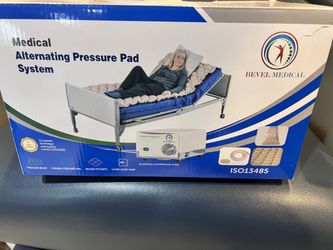 Medical pressure pad mattress top with pump