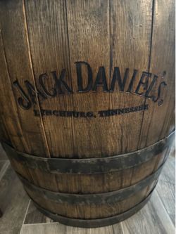 Authentic Jack Daniel’s whiskey barrel & stools
