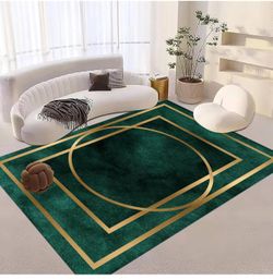 Green and Gold 6’ x 9’ area Carpet Rug