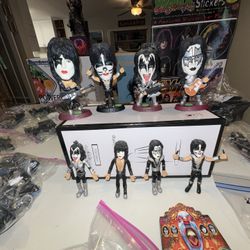 Lot of Kiss  items Gene Simmons Paul Stanley Vinny Vincent Ace Freeley 25 year collection of various items figurine, dolls, drum sets, and accessories