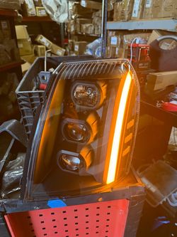 As is loose housing right side Cadillac Escalade LED Projector Headlight