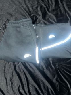 reflective nike tech size M