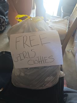 Bag of girls clothes large out on curb first come first serve