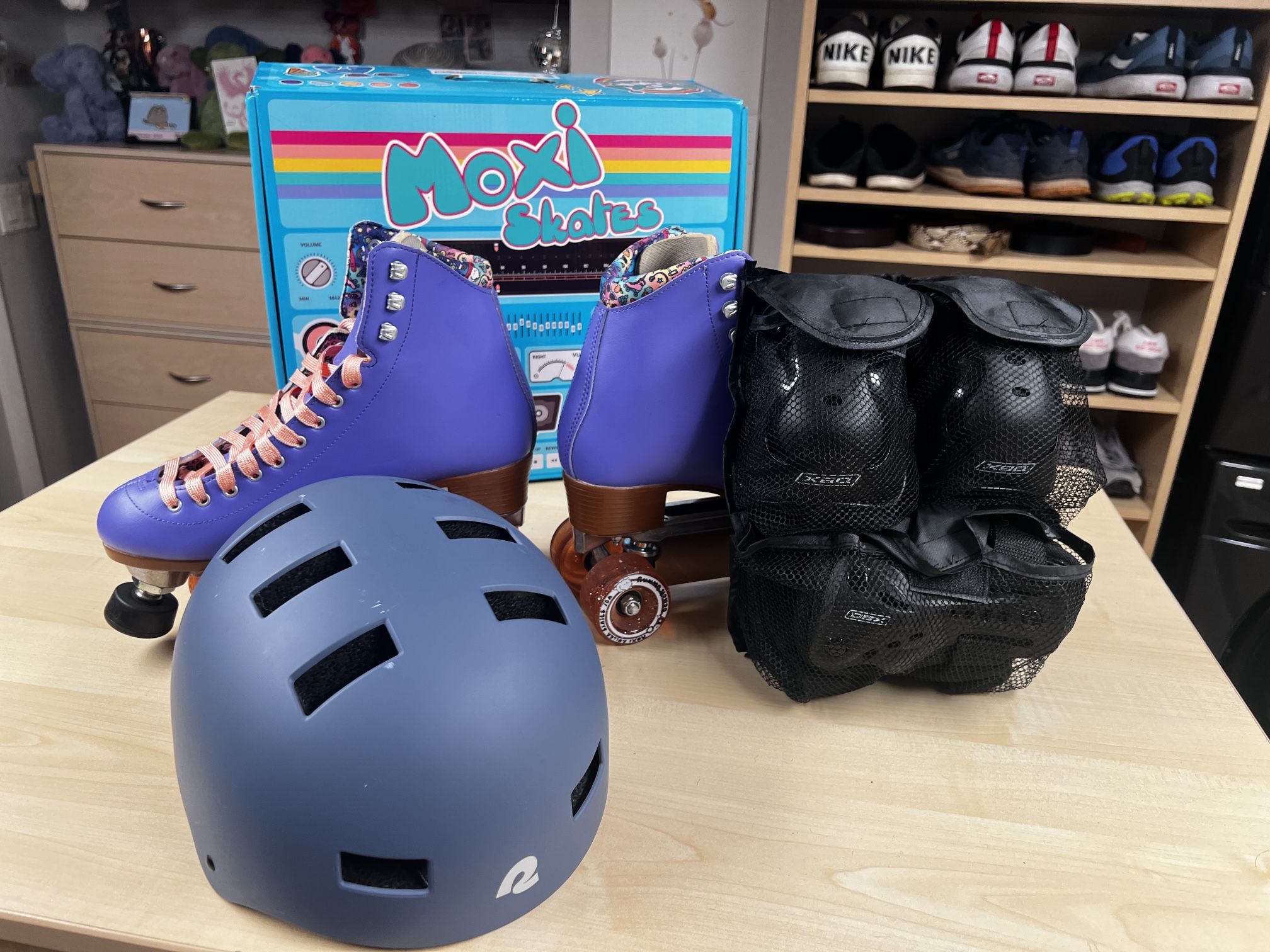 size 9 moxi skates, size med wrist/knee/elbow guards and a size med helmet