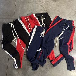 6 Pair Of Striped Sweatpants