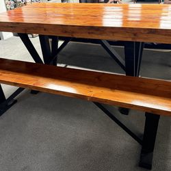 Flamed wood table and bench