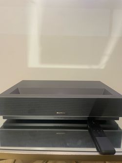 WEMAX Nova 4K Ultra Short Throw Laser Projector in excellent open-box condition.