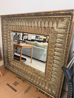 decorative rectangular wall mirror featuring an ornate, antique gold-finished frame - 70” x 60” - Retail: $1800