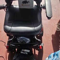 Golden BuzzAround Carryon electric wheelchair
