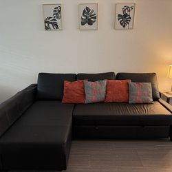 Ikea sofa bed.  Black Leather