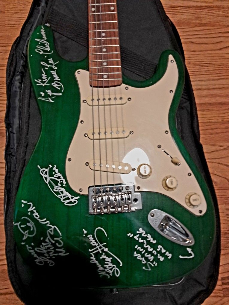 Electric Guitar Sign By Girls Band Iron Maiden