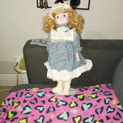 Country Porcilin Doll Blue Dress Pouting Face