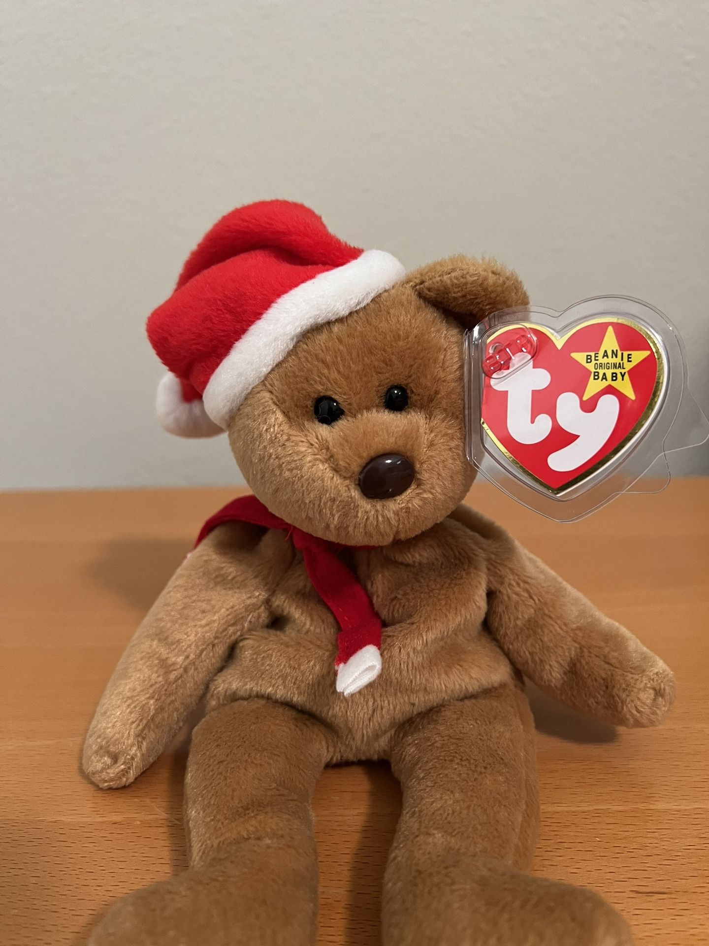  Ty Original Beanie Babies 1997. . New Condition.  He is wearing a red scarf with white fringe and a red hat with white