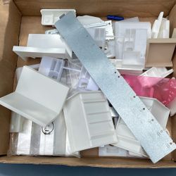 Box Of IKEA Cabinet Parts