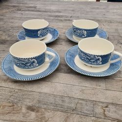 Currier and Ives teacups and saucers
