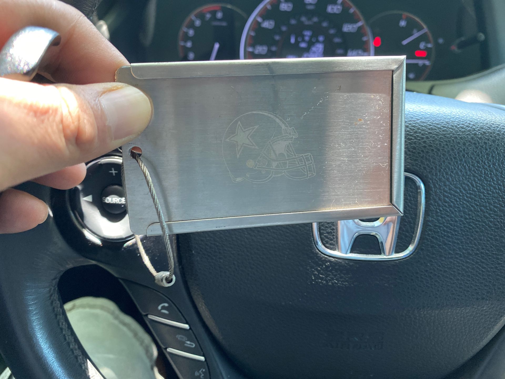 Aluminum tag cowboys from the old stadium