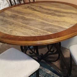 Ashley round dinning  table and 3 chairs only