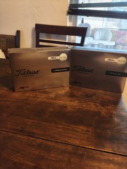 Titliest pro v1x Left Ash and aim enhancement golf balls each box contains 12 balls