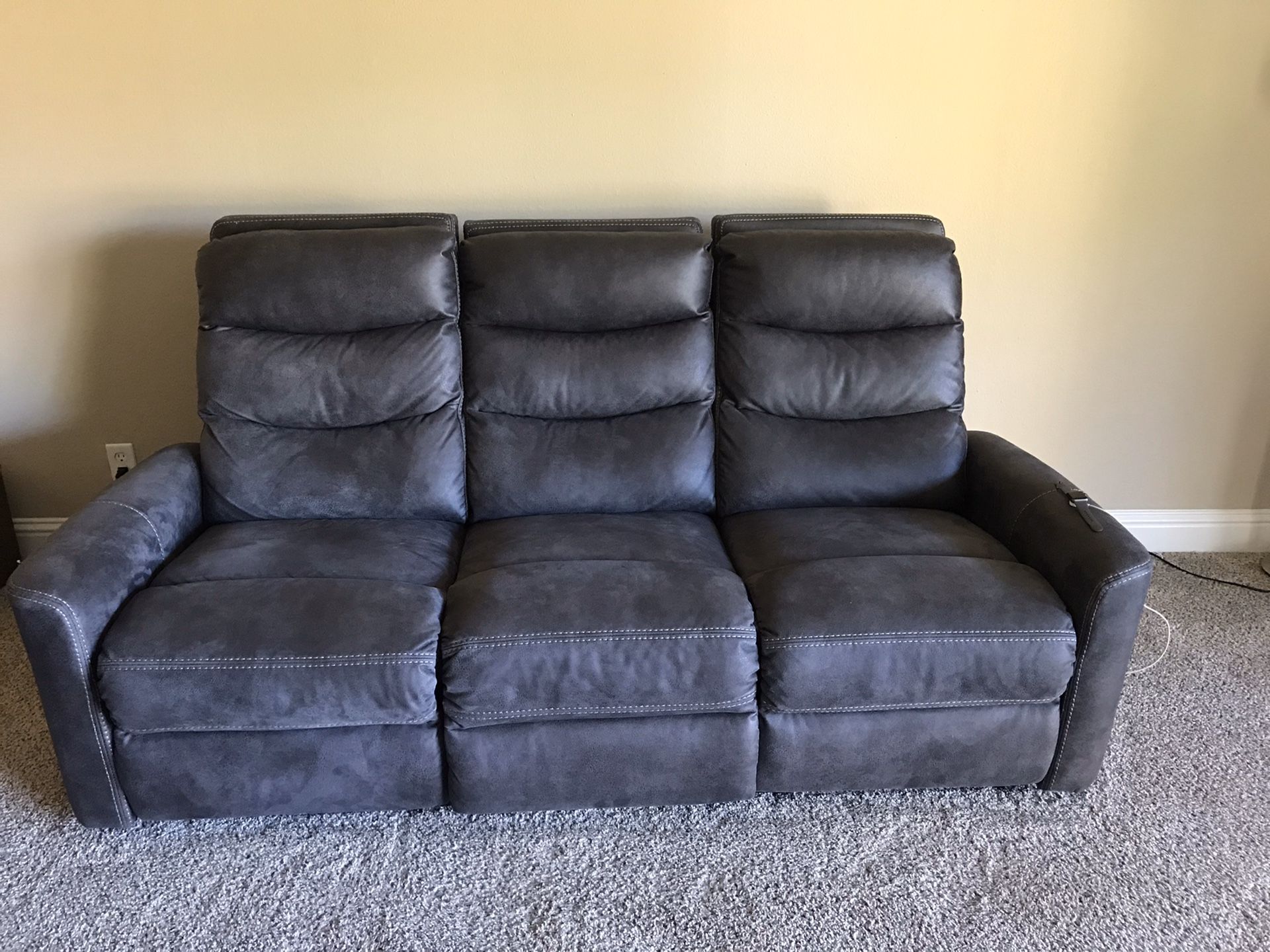 Power recliner Sofa from living spaces 8 months old