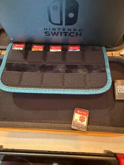 Nintendo switch 1 with pro controller and 2 cases, multiple games