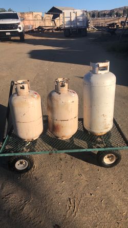 3 large propane tanks