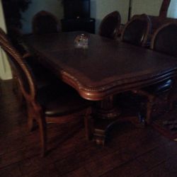 Large Dining Room Table With Beautiful  8 Soft Chairs