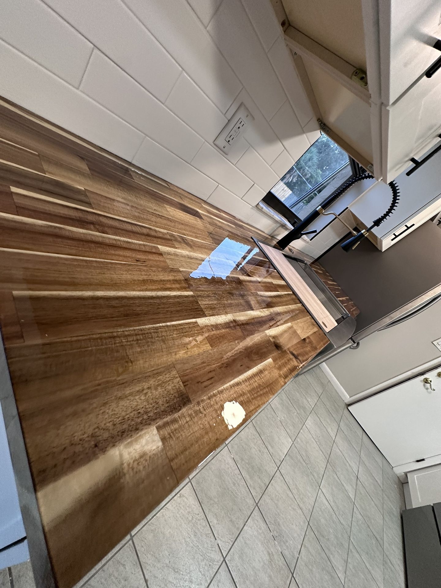 New kitchen, New cabinets, New Faucet.