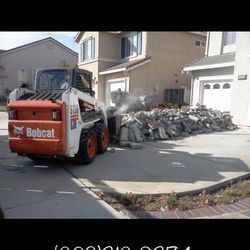 Bobcat and excavating operation