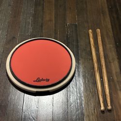 Practice Drumpad And Drum Sticks