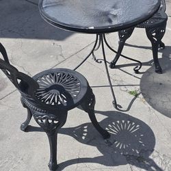 Metal Chairs And Table 
