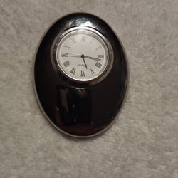 Nice Egg Shape Chrome Clock. It Runs By Batteries Nice For A Desk $10