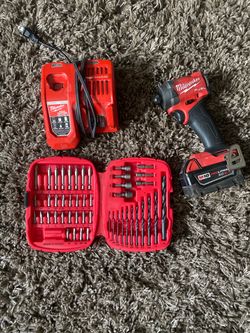 Milwaukee fuel impact, charger, new bit set