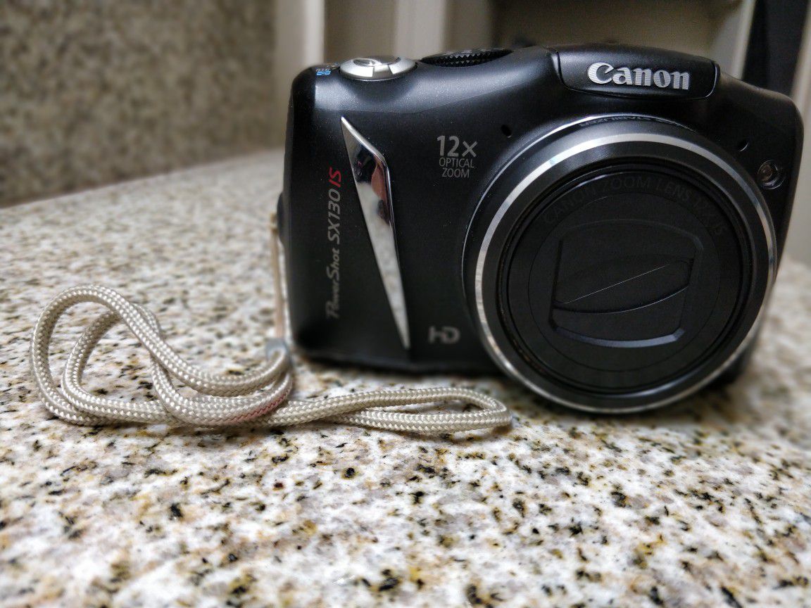 Canon PowerShot SX130 IS with 4 gb SanDisk memory card