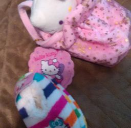 NEW, with tags, toddler size 4/5 girl Hello Kitty slippers and plush purse / handbag
