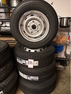 Firestone Transforce CV2 235/65R16C Tires and rim