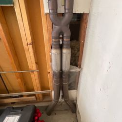 Mid pipe with resonator