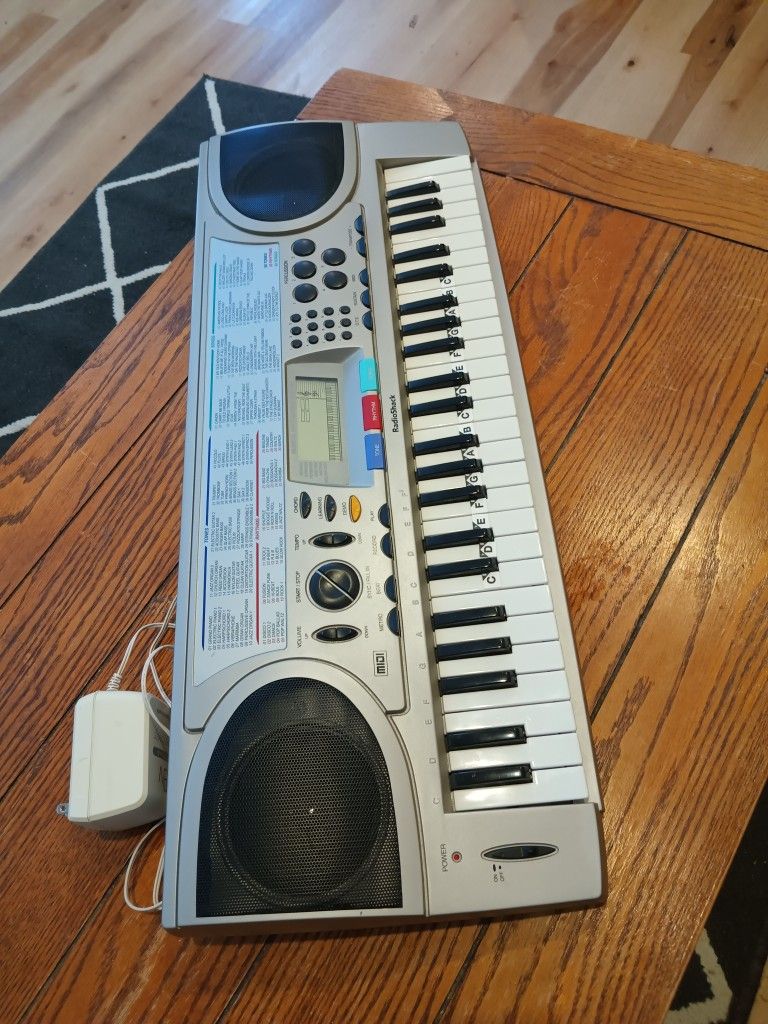 RadioShack electric keyboard 50 tones 30 rhymes 50 songs work perfectly 