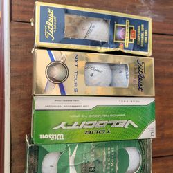 Brand NEW in boxes One Dozen Golf balls
