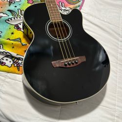 Ibanez acoustic electric bass guitar with tags