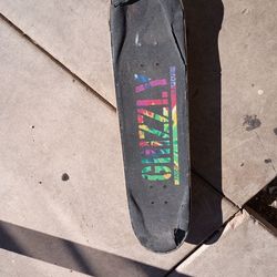 Skateboard deck with trucks