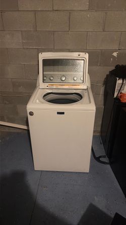 The brand is Maytag color white