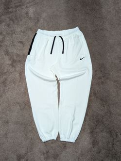 White Nike DriFit cuffed sweats