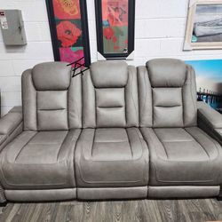 The Man-Den Gray Power Reclining Sofa And Loveseat
Ashley Furniture$10 Down Payment And Financing Available
