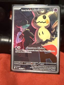 Team Rocket's Mimikyu 238/217 Pokémon Card