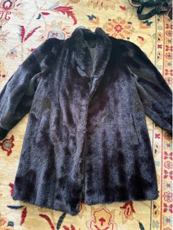 Black faux fur coat
