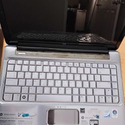 HP Pavilion dv4-1123us 14.1" Widescreen Notebook Computer With Intel Core™2 Duo Processor T5800