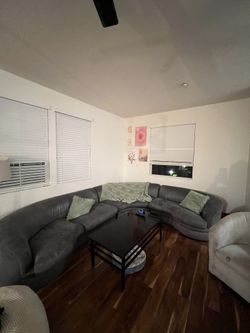 L shaped/ curvy sofa