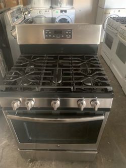 Gas stove ge good condition 90 days warranty Estufa gas ge buenas Condiciones 90 dias de Garantia
