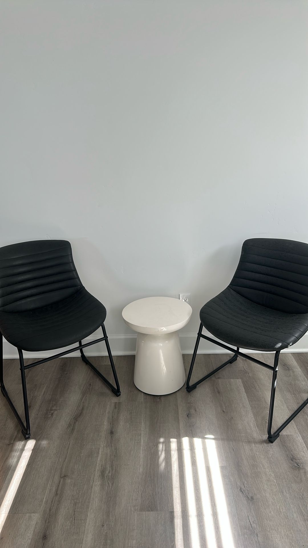 Black Chairs N White Stand